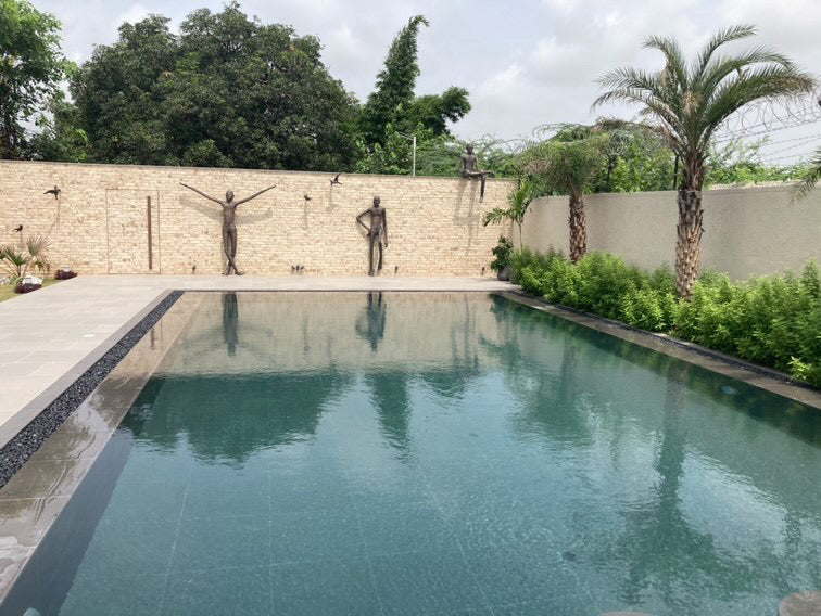 Poolside Figure Sculptures